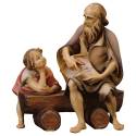 Berger et enfant sur un banc : crèche de Noël en bois Ulrich 15 cm