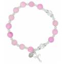 Bracelet sur élastique Rose + Médaille + Croix