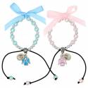 Armband op koord 2 engelen + kind - roze of blauw 