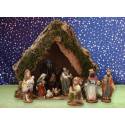 Crèche de Noël : cabane + 11 personnages de 9 cm (25x14x22cm)