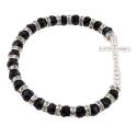 Armband op elastiek kristal met kruis 