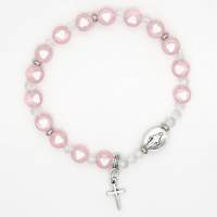 Bracelet sur élastique grains roses avec médaille miraculeuse et croix