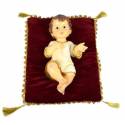 Enfant Jésus 34 x 22 cm + coussin rouge 36 X 36 cm